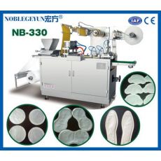 NB-330型暖寶寶包裝機(jī)，全自動(dòng)發(fā)熱貼生產(chǎn)設(shè)備